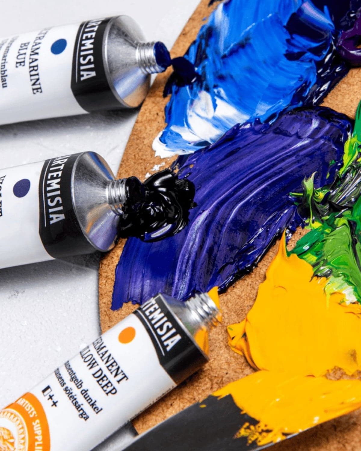 Artemisia artist paint tubes and cork palette with colours